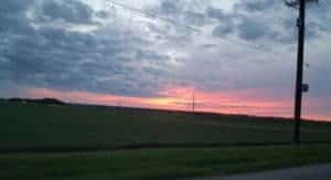 gravel road iowa sunset