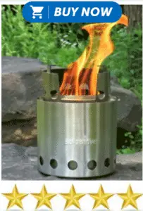 Metal stove fire on stones