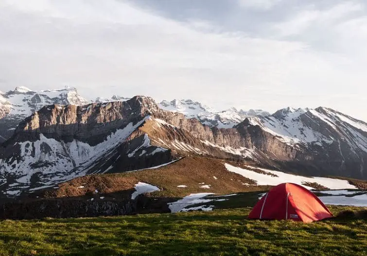 mountains, snow, and red tent