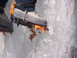 ice crampon on climber