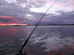 trolling for fish at dusk